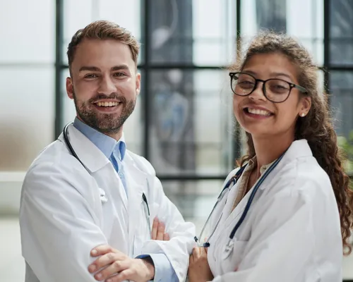 Équipe médicale souriante de la Clinique de Champel